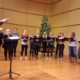 Chris Quinn plays to a choir of donors