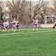 Westminster Lacrosse team plays on the field.