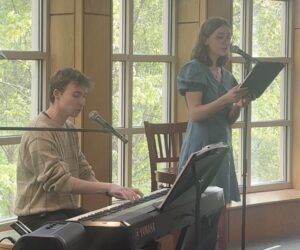 Two Westminster students performing in Giovale Library.