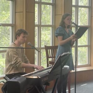 Two Westminster students performing in Giovale Library.