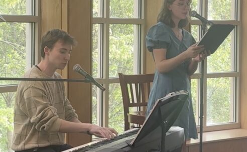 Two Westminster students performing in Giovale Library.